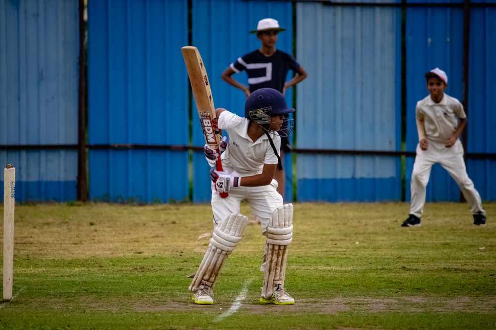Students playing sports on the field